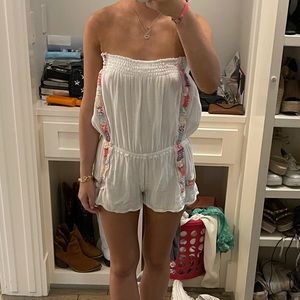 White and pastel patterned planet blue romper